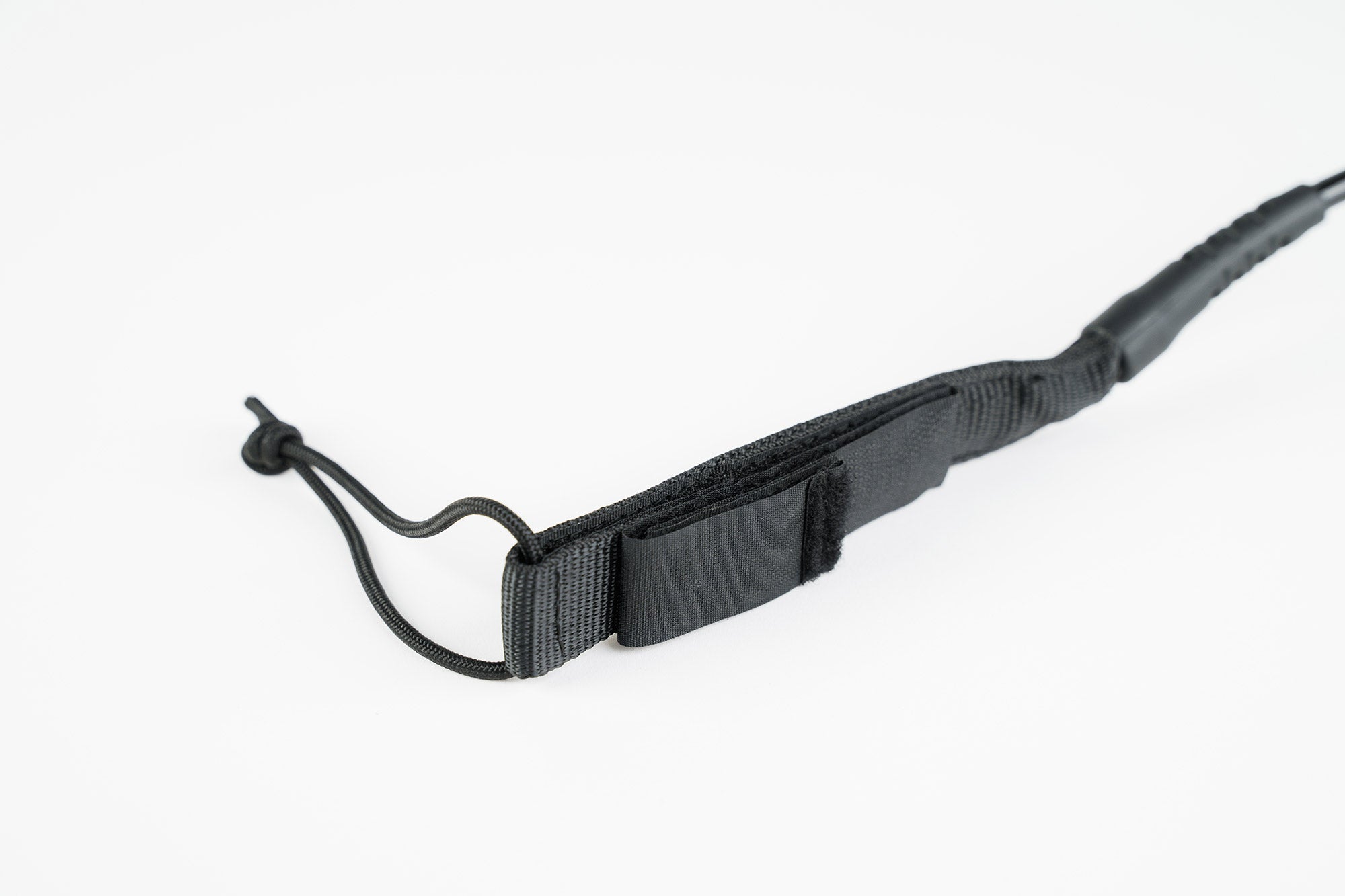 Leash surf/wing board coiled tobillo
